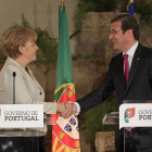 Angela Merkel con el primer ministro luso, Passos Coelho.