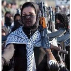 Mujeres iraquíes desfilan armadas en una marcha por el valle del Tigris
