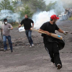 Enfrentamientos entre mineros y policía en el pozo Sotón.