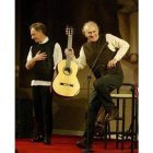 Juan Carlos Mestre y Amancio Prada, en un concierto.