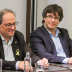 El presidente de la Generalidad, Quim Torra, junto a Carles Puigdemont. LECOCQ