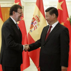 Mariano Rajoy saluda al presidente chino, Xi Jinping, en septiembre del 2014.
