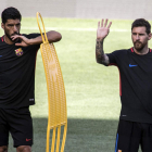 Messi, a la derecha, afronta el choque tras marcar un triplete con Argentina. EDU BAYER