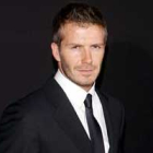 David Beckham posa durante el desfile de Emporio Armani.