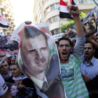 Manifestación en apoyo a Al Assad y en rechazo a la resolución de la Liga Árabe.