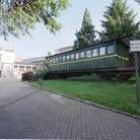 El vagón del antiguo tren Correo que acoge la oficina de turismo de Villablino
