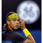 Rafa Nadal en acción durante un partido contra Roger Federer