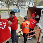 Descarga de alimentos de Cruz Roja en León. CR