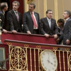 El líder del PNV, Iñigo Urkullu, con los tres diputados generales vascos en el Congreso.