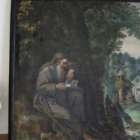 Joan Bosch junto a uno de los lienzos de los ermitaños que alberga el Convento de las Clarisas de Vi