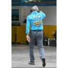 Flavio Briatore camina por el paddock tras la prueba disputada ayer