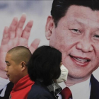 Cartel del presidente chino, Xi Jinping, en una calle de Pekín