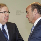 Juan Vicente Herrera y Luis de Guindos, ayer, en Burgos.