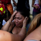 Los familiares de los menores fallecidos esperan ansiosos en el refugio de Virgen de la Asunción.