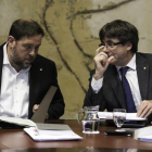 Oriol Junqueras y Carles Puigdemont, el martes, en la reunión del Consell Executiu.