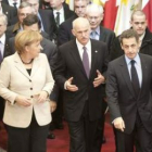 La alemana Angela Merkel, el griego George Papandreu y el francés Nicolas Sarkozy.