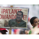 Pancarta de apoyo a Hugo Chávez, durante una marcha solidaria con el presidente venezolano, el domingo en Caracas.
