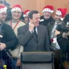 Schröder celebra la Navidad con un grupo de fotógrafos de prensa