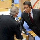 El presidente gallego en funciones Touriño saluda a Núñez Feijóo