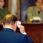 El presidente italiano, Silvio Berlusconi, durante un momento de su declaración en el juicio
