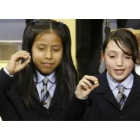 Las niñas del colegio de San Ildefonso Alicia Rodríguez y Yahaira Gonzaga cantaron el Gordo.