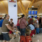 Colas en uno de los aeropuertos afectados.