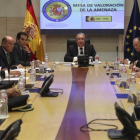 La mesa de evaluación, presidida por el ministro Juan Ignacio Zoido.