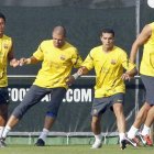 Thiago, Victor Valdés, Pedro y Piqué preparan el partido contra el Sporting de Gijón.