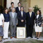 Foto de familia de los premiados, con Martín Manceñido al frente.