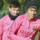 Los barcelonistas Messi y Neymar durante el entrenamiento del Barcelona.