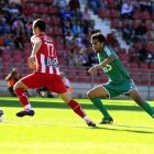 Juande (d), en una acción del partido de ida ante el Girona.