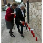 Velas rojas, flores y un poema de Miguel Hernández para Silvia