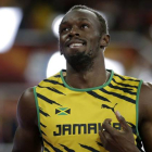 Usain Bolt en las semifinales de 100 en Pekín.