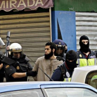 Uno de los yihadistas detenidos, este viernes en el barrio de la Cañada de Hidum, en Melilla.