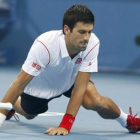 Djokovic se cae al suelo durante su partido de semifinales contra Gasquet en Pekín.