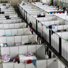 Módulos prefabricados en el viejo aeropuerto berlinés de Tempelhof  para acoger a los refugiados.