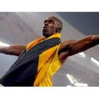 El jamaicano Usain Bolt se mostraba exultante tras su victoria y récord mundial en 200 metros lisos
