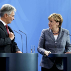 La cancillera alemana, Angela Merkel, y su homólogo austríaco, Werner Faymann.