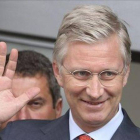 El príncipe Felipe de Bélgica, que se convertirá en Jefe del Estado el próximo 21 de julio, sonríe tras su participación en una conferencia sobre vegetación en Amberes (Bélgica), el pasado 4 de julio.