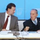 Rajoy y el presidente de honor del partido, Fraga, en la reunión del Comité de Dirección.