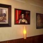 Algunos cuadros de la exposición de Luz Blanco en el café Diario