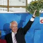 Angela Merkel celebra el triunfo de la CDU en los comicios renanos junto a Jürgen Rüttgers