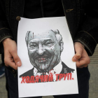 Imagen de un cartel con una caricatura de Lukashenko. WOJCIECH OLKUSNIK