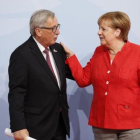 Jean Claude Juncker y Angela Merkel, en la cumbre del G-20 del pasado mes de julio en Hamburgo.