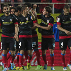 Los jugadores del Atlético celebran el único gol del partido.
