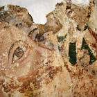 El rostro de San Cristóbal en una vista parcial de estas pinturas que probablemente daten del siglo XV. F. OTERO PERANDONES