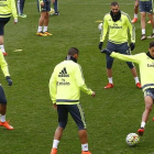 Ronaldo, Benzema y Varane, durnate el entrenamiento de este viernes en Valdebebas.