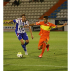 El central catalán Ignasi Miquel se retiró cojeando del entrenamiento de ayer.