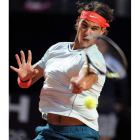 Rafa Nadal devuelve la bola a su compatriota David Ferrer.