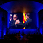 Proyección de un vídeo con momentos de la trayectoria de Artur Mas, proyectado durante el consell nacional de ayer. QUIQUE GARCÍA